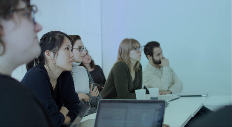 Group of students attending a lesson