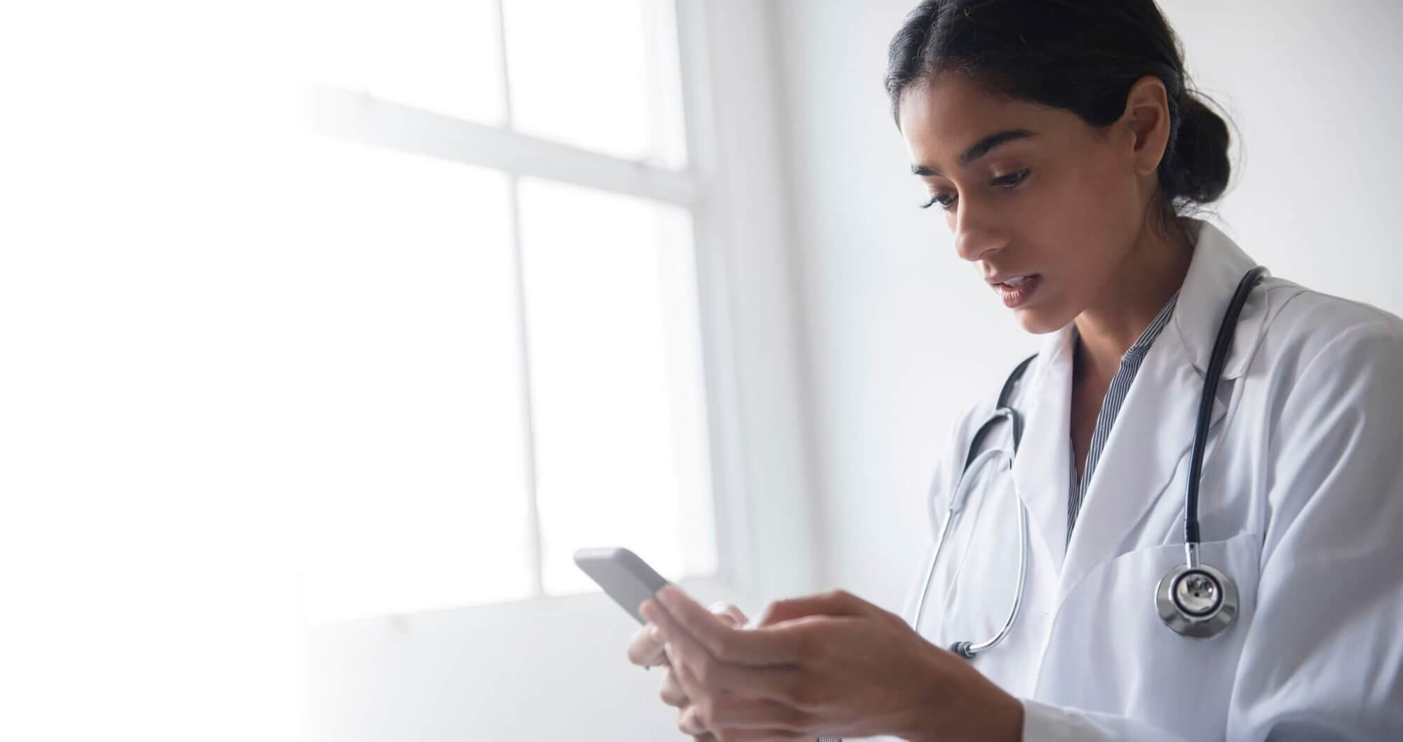 Image of a doctor using a smartphone