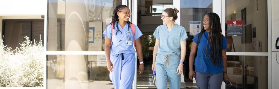 3 women talking and smiling